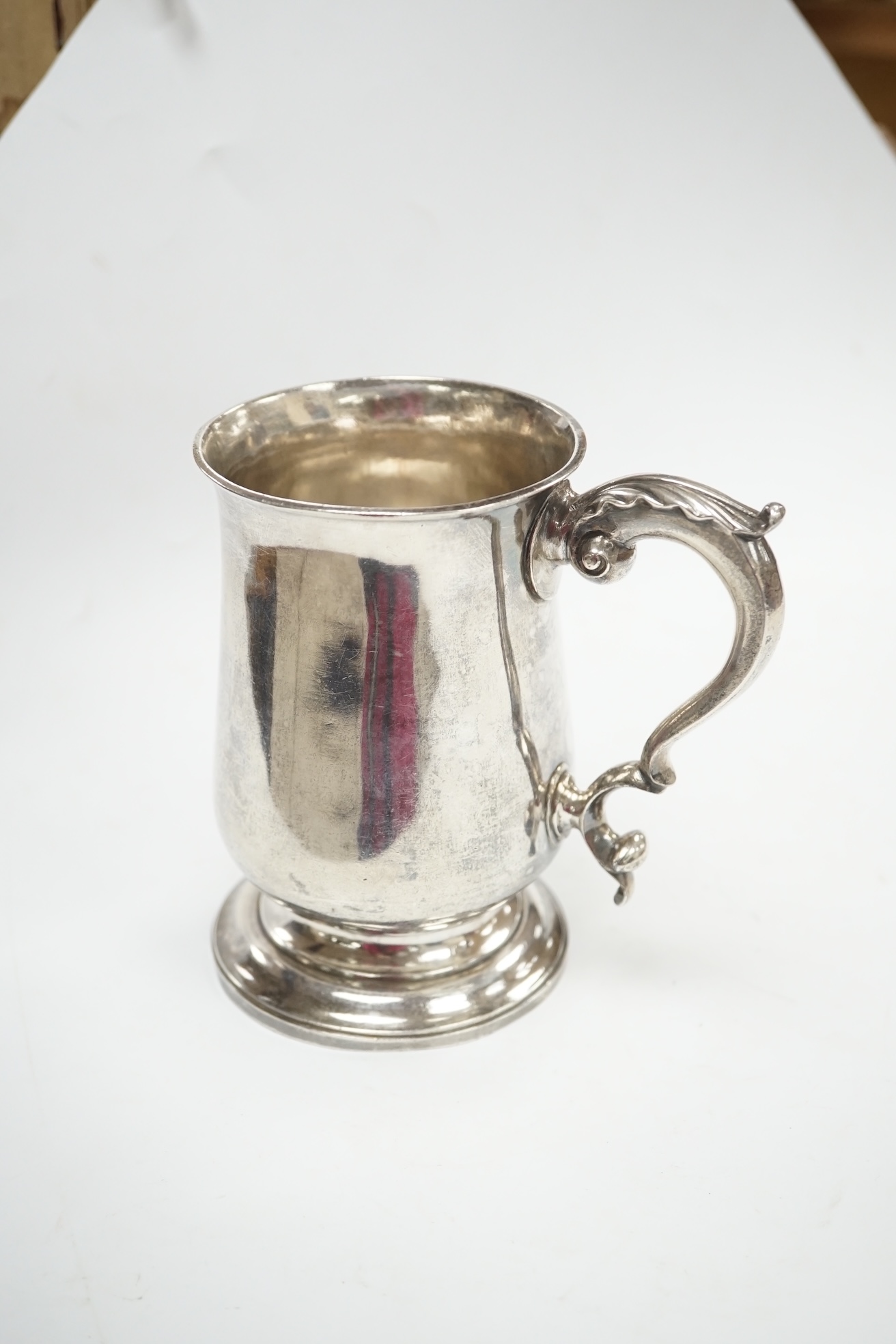 A George III silver baluster mug, William Turton, London, 1779, 12.5cm, 10.8oz. Condition - fair